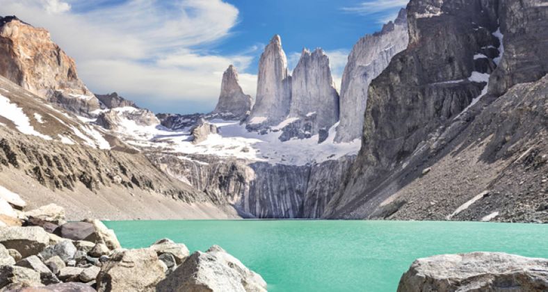 View of Torres del Paine National Park with trekking trails and mountains.